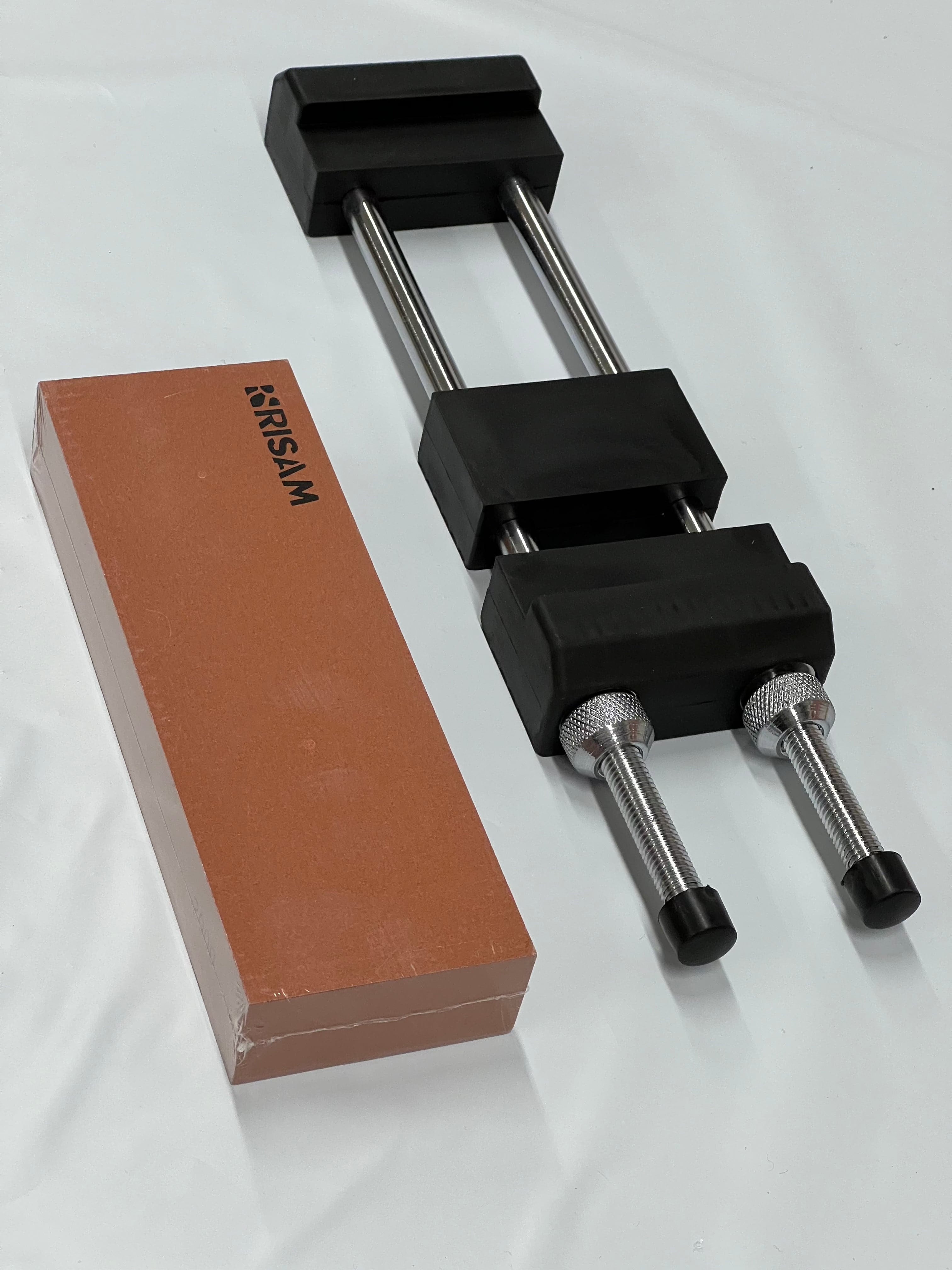 Hållare för slipsten