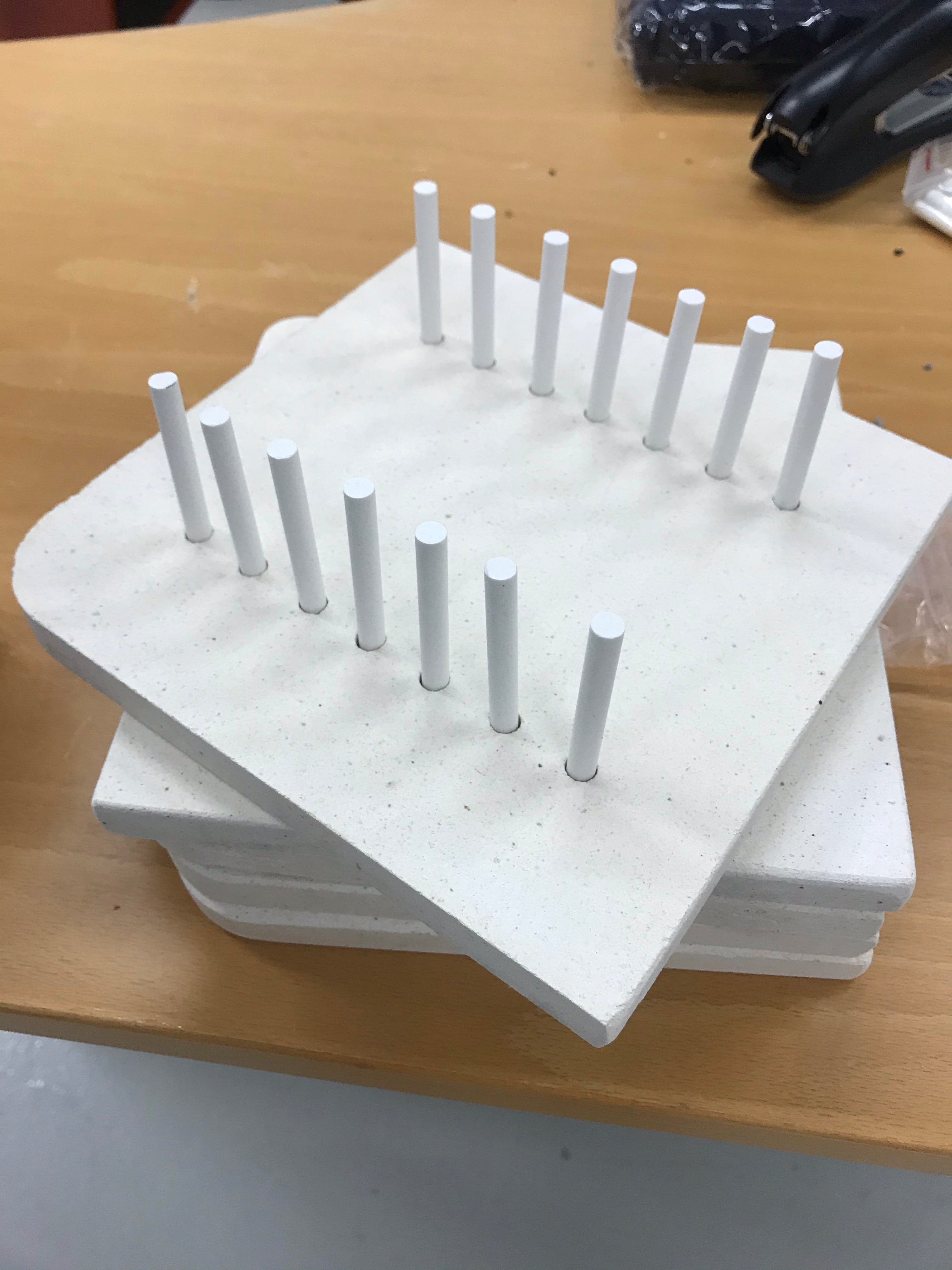 Knivbladshållare för härdningsugn